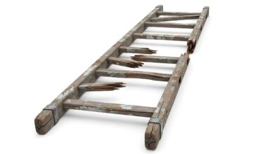 Broken wooden ladder with missing rungs isolated on white background with shadow. AI Generated.