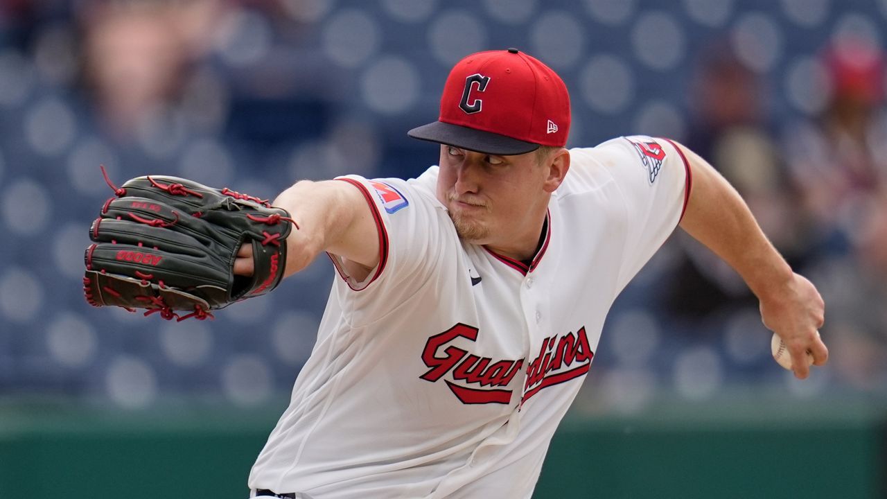 Cleveland Guardians' Angel Martínez scores on a single hit by Gabriel Arias as Detroit Tigers catcher Dillon Dingler, right, reaches with the tag during the fourth inning of Game 1 of the American League Wild Card baseball playoff series in Cleveland, Tuesday, Sept. 30, 2025.