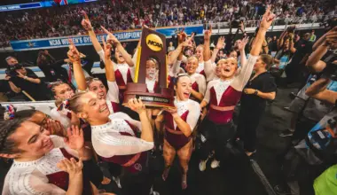 People holding a trophy