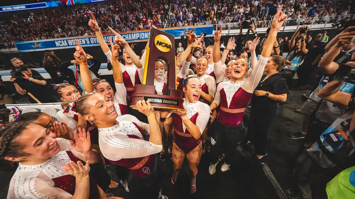 People holding a trophy