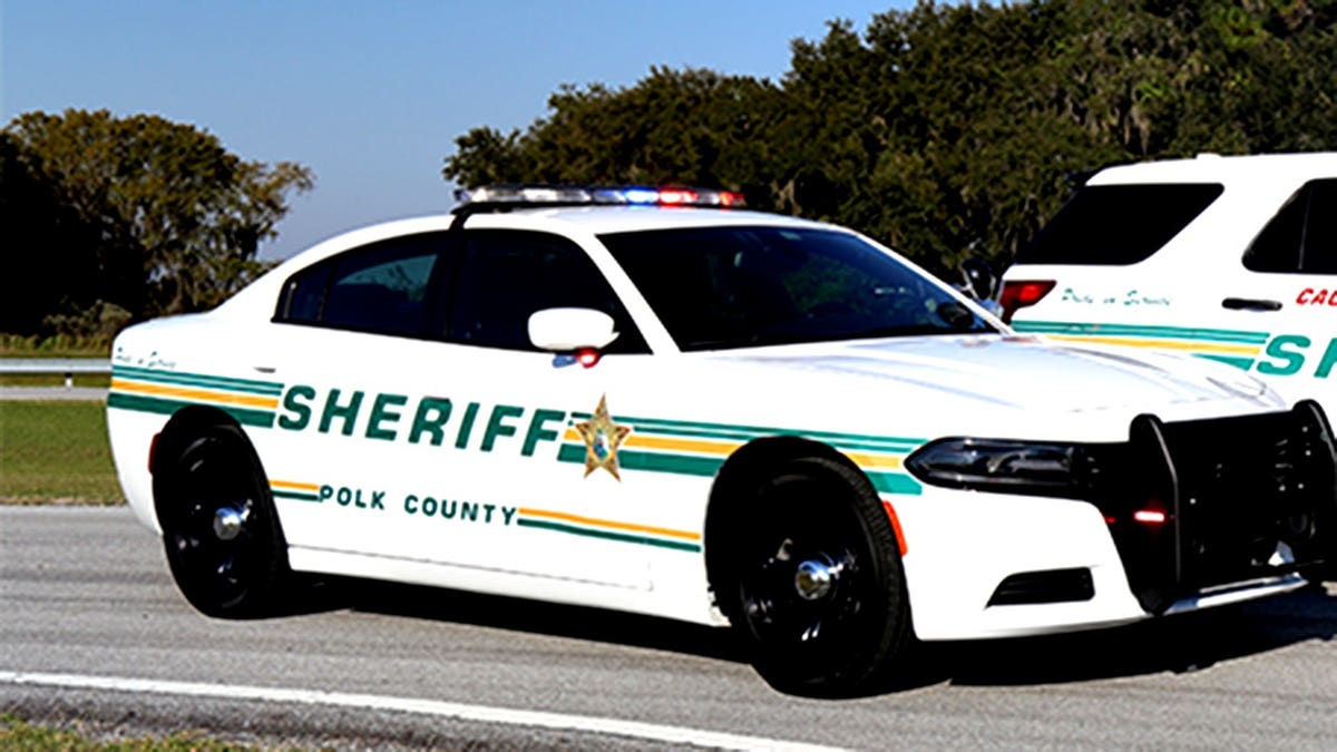 Polk County Sheriff's vehicles on a street