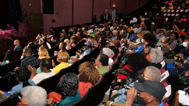 Crowds watch on at Reclaim the Dream Candlelight Memorial and Gospel Concert. The Liberty City nonprofit Martin Luther King Economic Development Corporation holds the event to commemorate Dr. King during the anniversary week of his assassination.