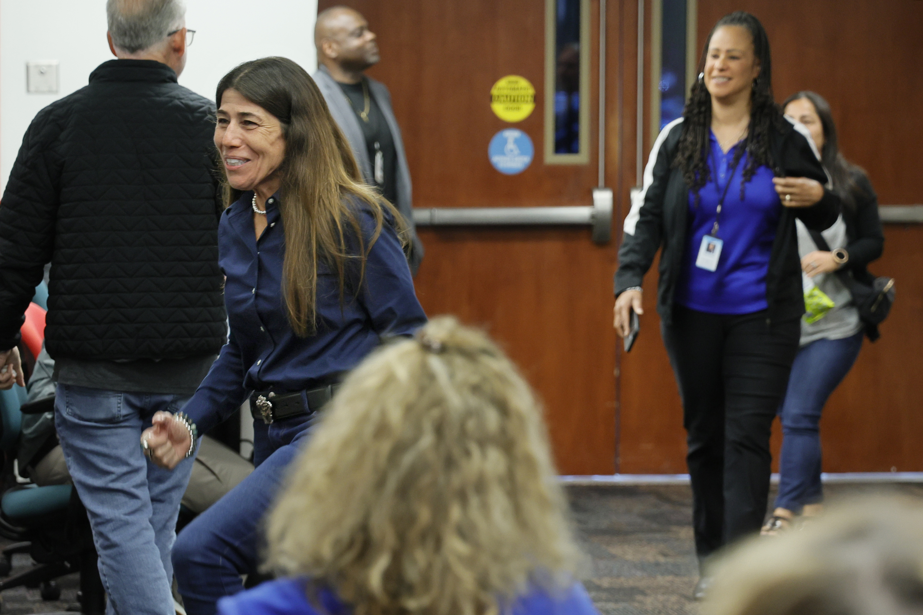 As she exits the board room, Broward Teachers Union President...