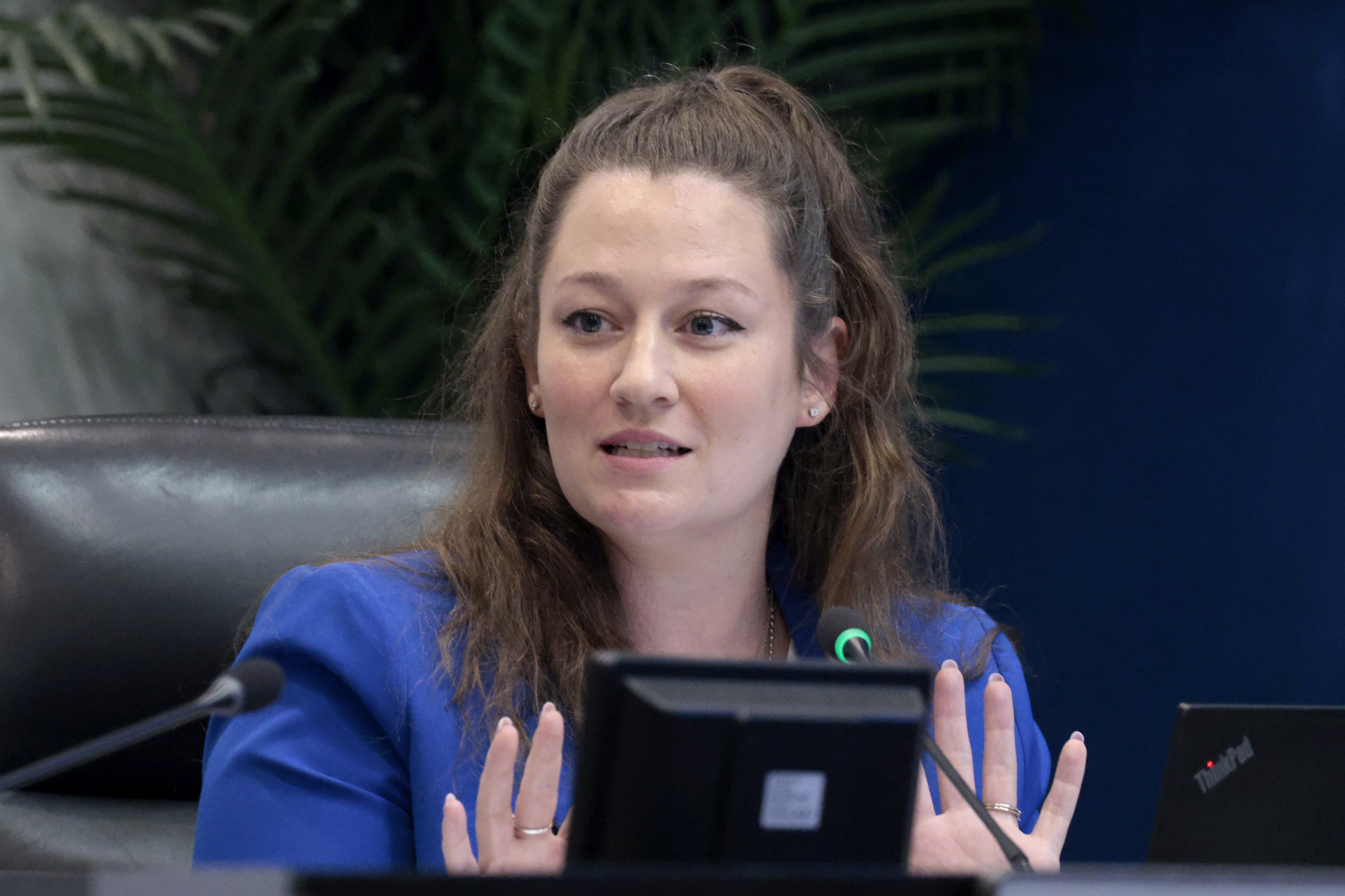 School Board member Rebecca Thompson asks a question during a...