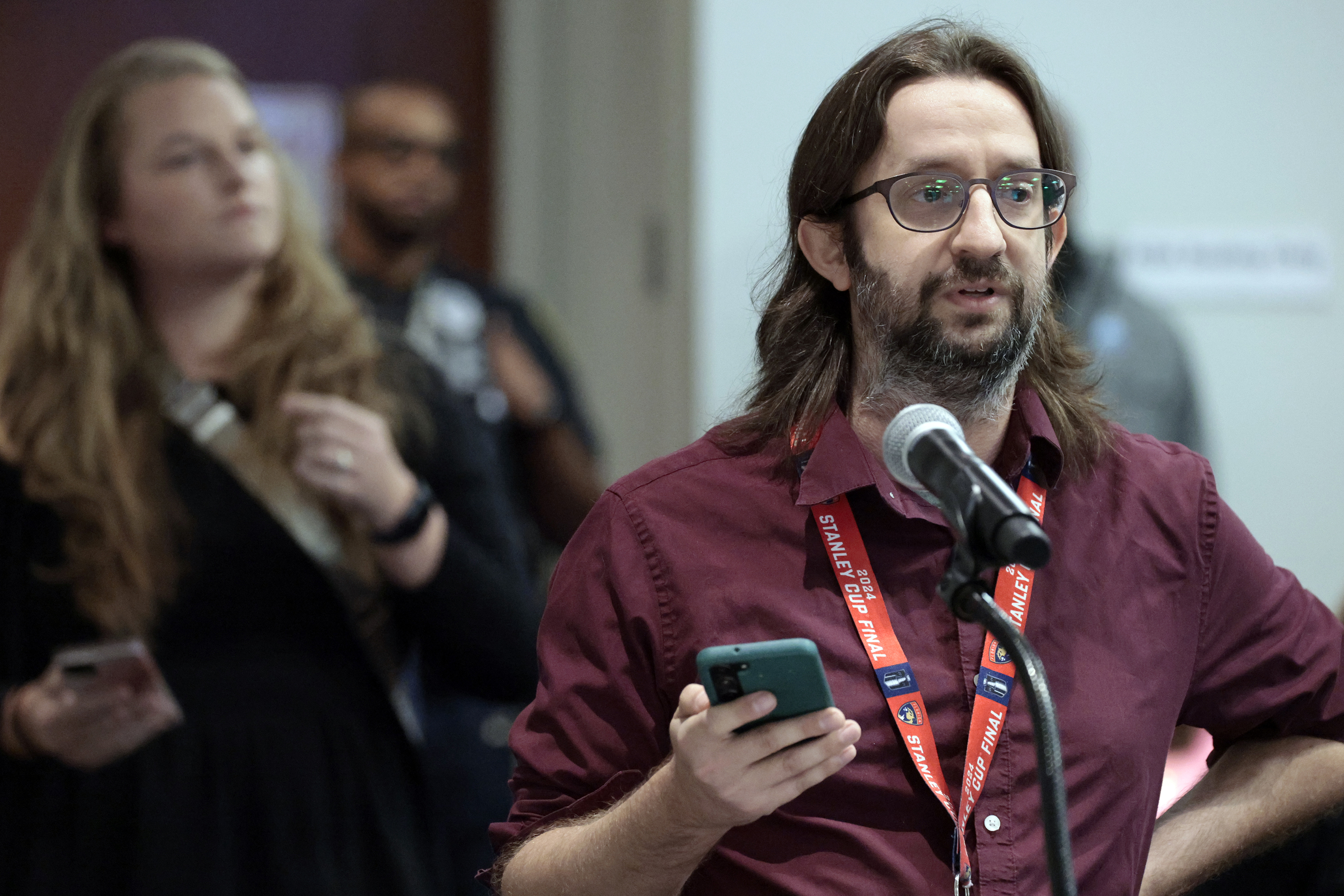 Fort Lauderdale High School math teacher Thomas Handwerg speaks during...
