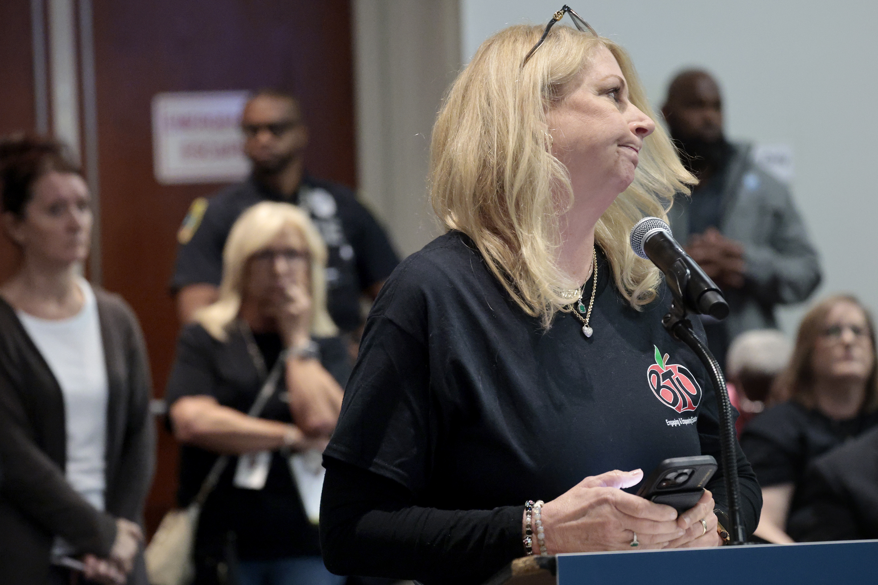 Mary Carr leaves the podium after speaking during a Broward...