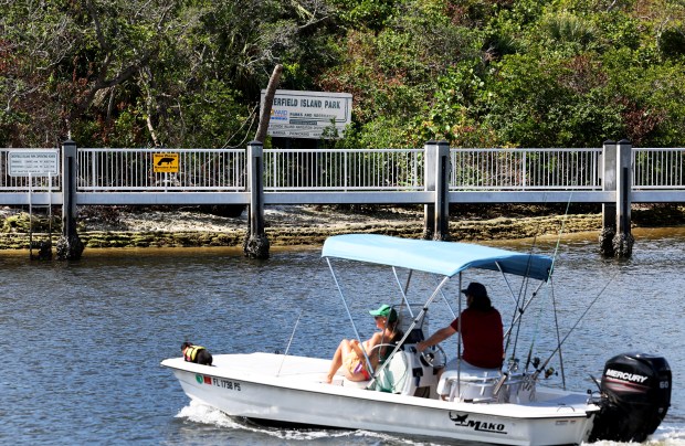 Boaters pass Deerfield Island Park in Deerfield Beach on Monday, May 6, 2024. The park is closed for renovations. (Carline Jean/South Florida Sun Sentinel)
