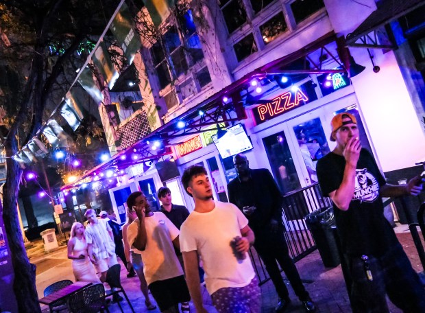 Bars on Himmarshee Street draw a crowd to downtown Fort Lauderdale during Spring Break on March 21, 2025. (Scott Luxor/Contributor)
