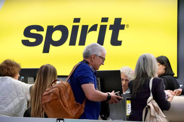 Travelers wait in line at the Spirit Airlines service desk in Terminal 4 at Fort Lauderdale-Hollywood International Airport on Thursday, April 16, 2026. (Joe Cavaretta/South Florida Sun Sentinel)