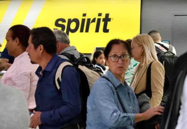 Travelers wait in line at the Spirit Airlines service desk in Terminal 4 at Fort Lauderdale-Hollywood International Airport on Thursday, April 16, 2026. (Joe Cavaretta/South Florida Sun Sentinel)