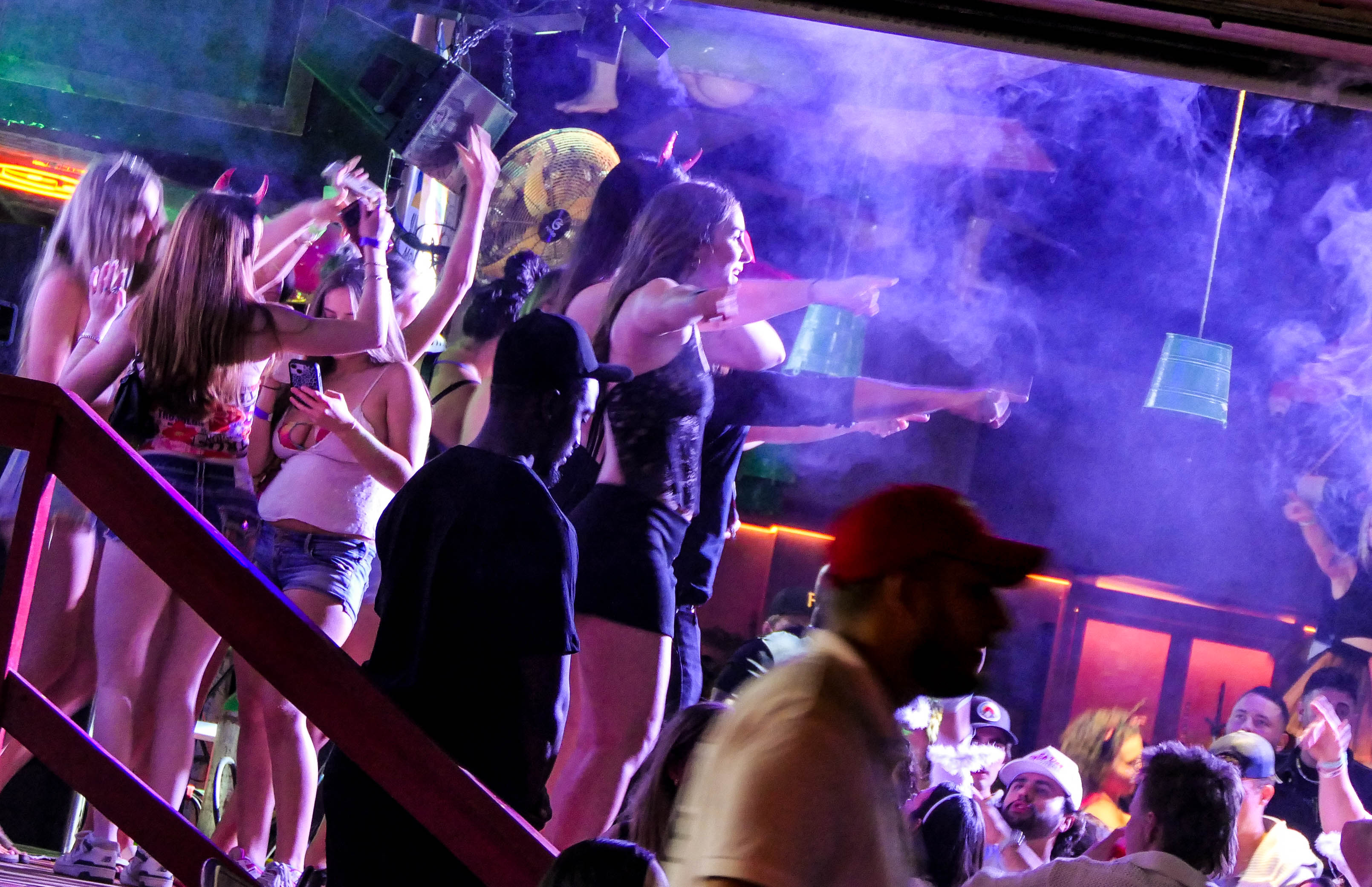 People visit bars along A1A as the Fort Lauderdale beachfront...