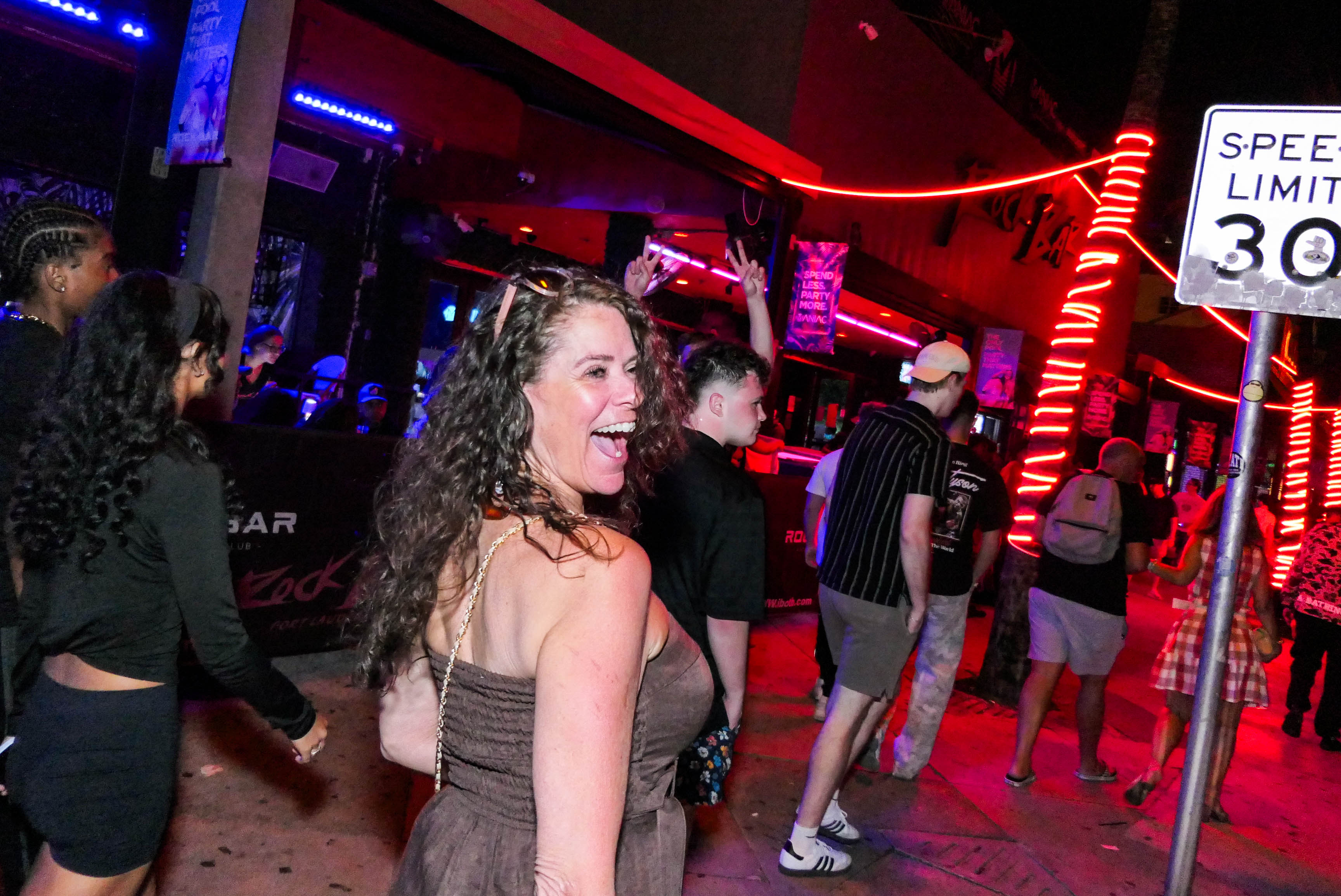 People visit bars along A1A as the Fort Lauderdale beachfront...