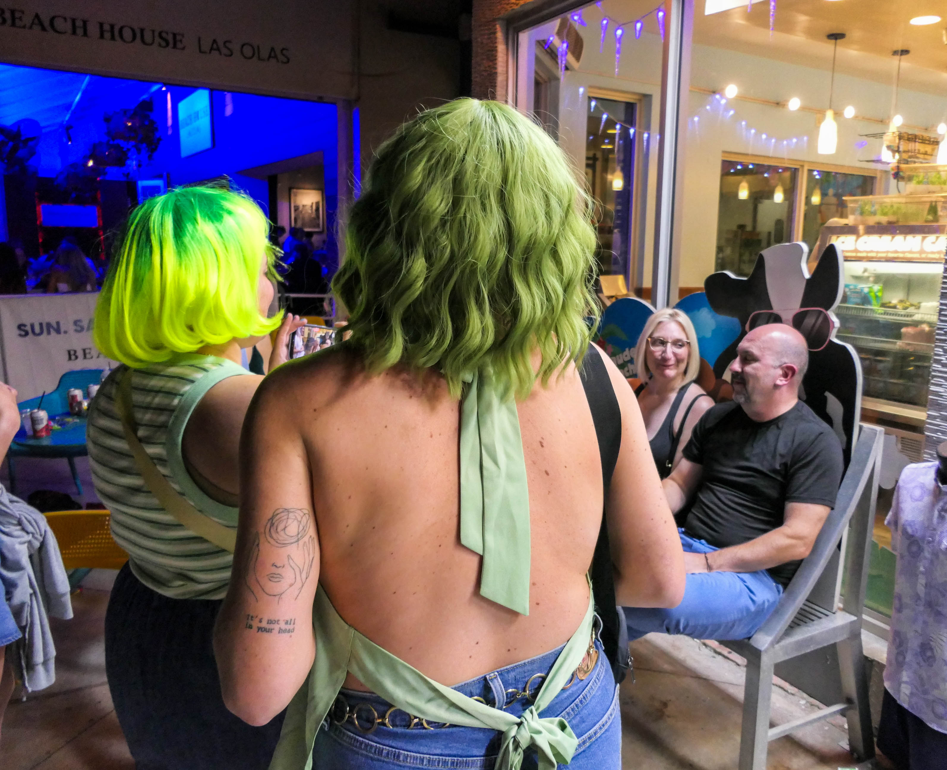 People visit bars along A1A as the Fort Lauderdale beachfront...