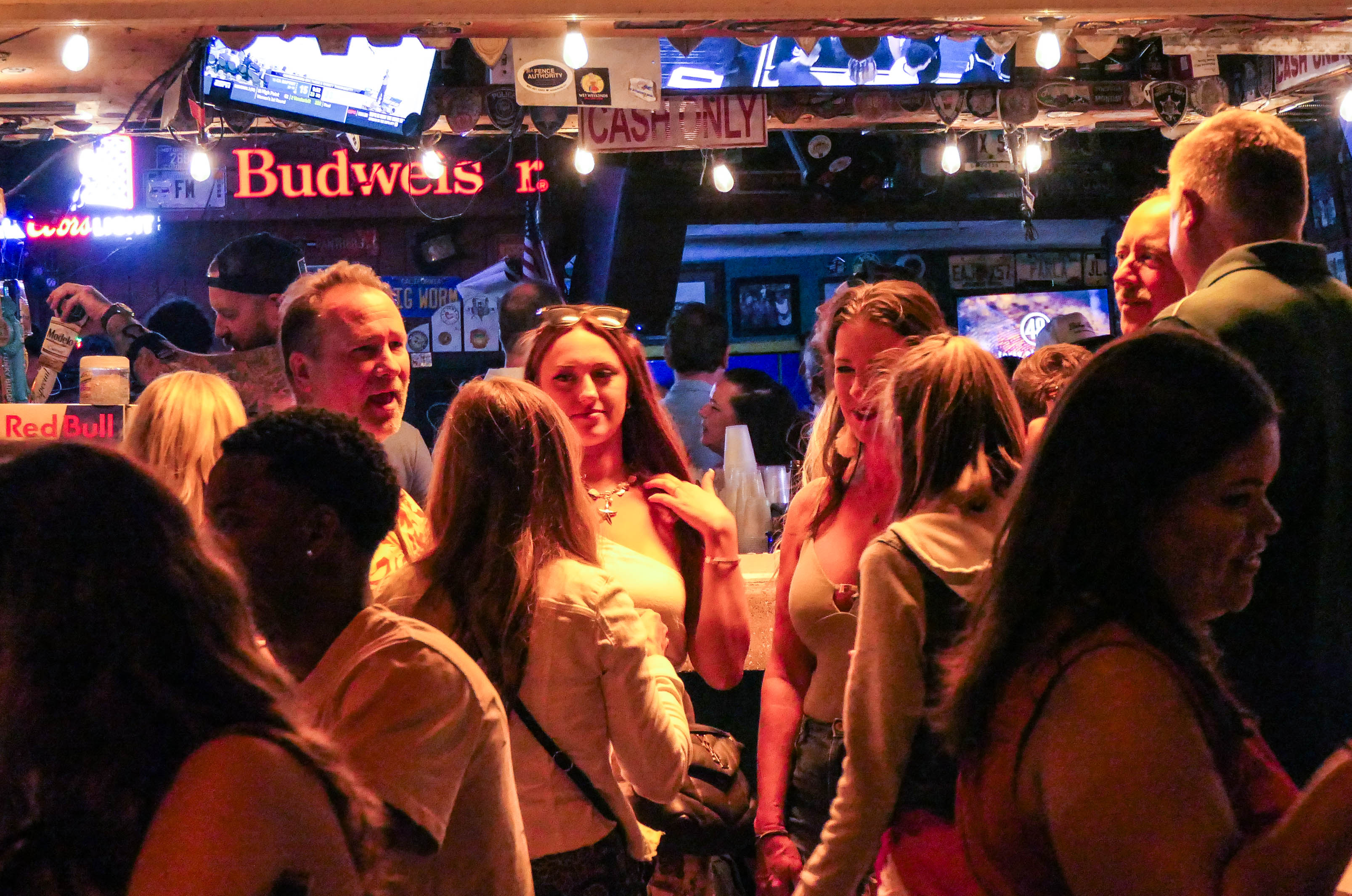 People visit bars along A1A as the Fort Lauderdale beachfront...