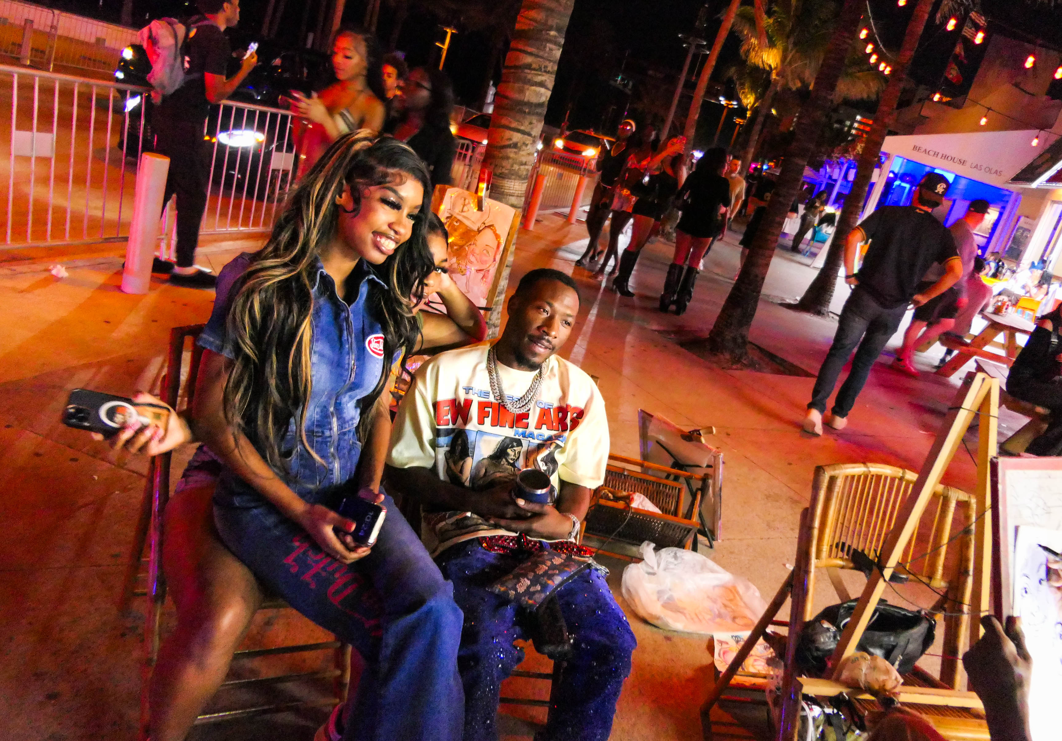 People visit bars along A1A as the Fort Lauderdale beachfront...