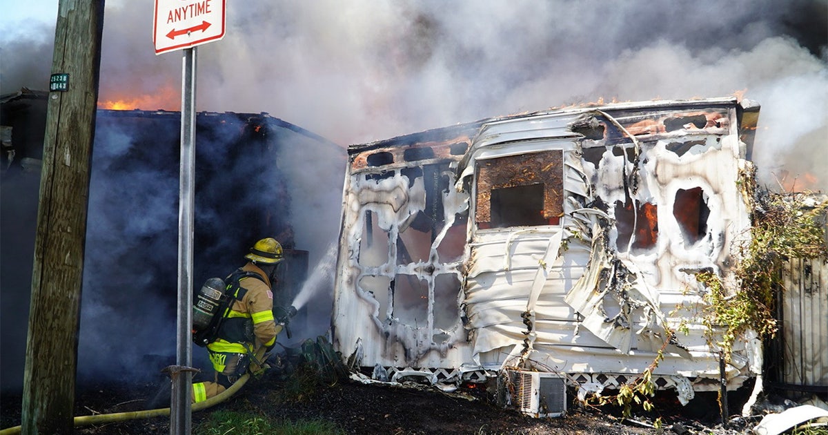 Tampa mobile home fire spreads to at least 4 residences, dog rescued: TFR