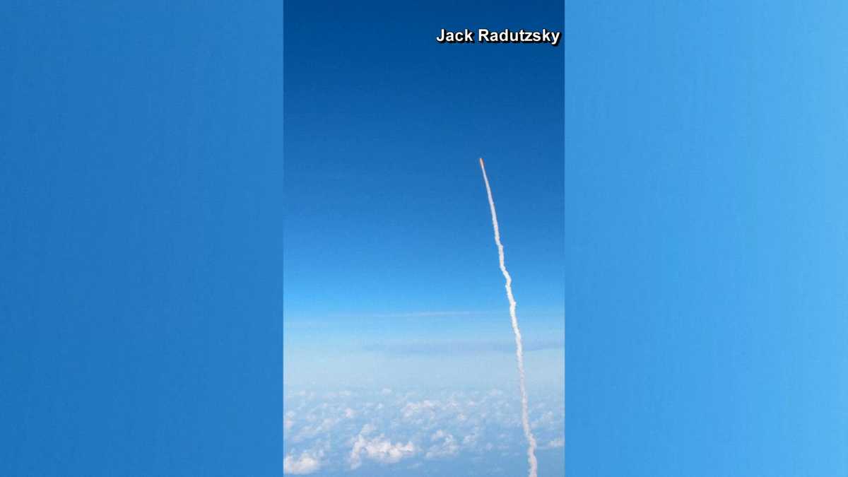 Passengers on flight capture Artemis II launch from Florida