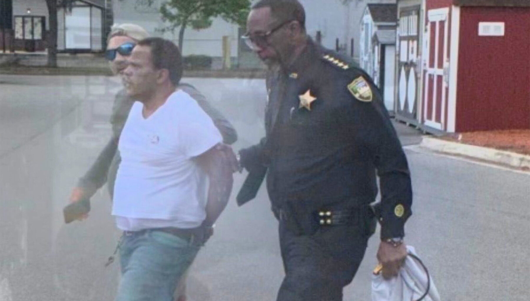 Man being taken into custody