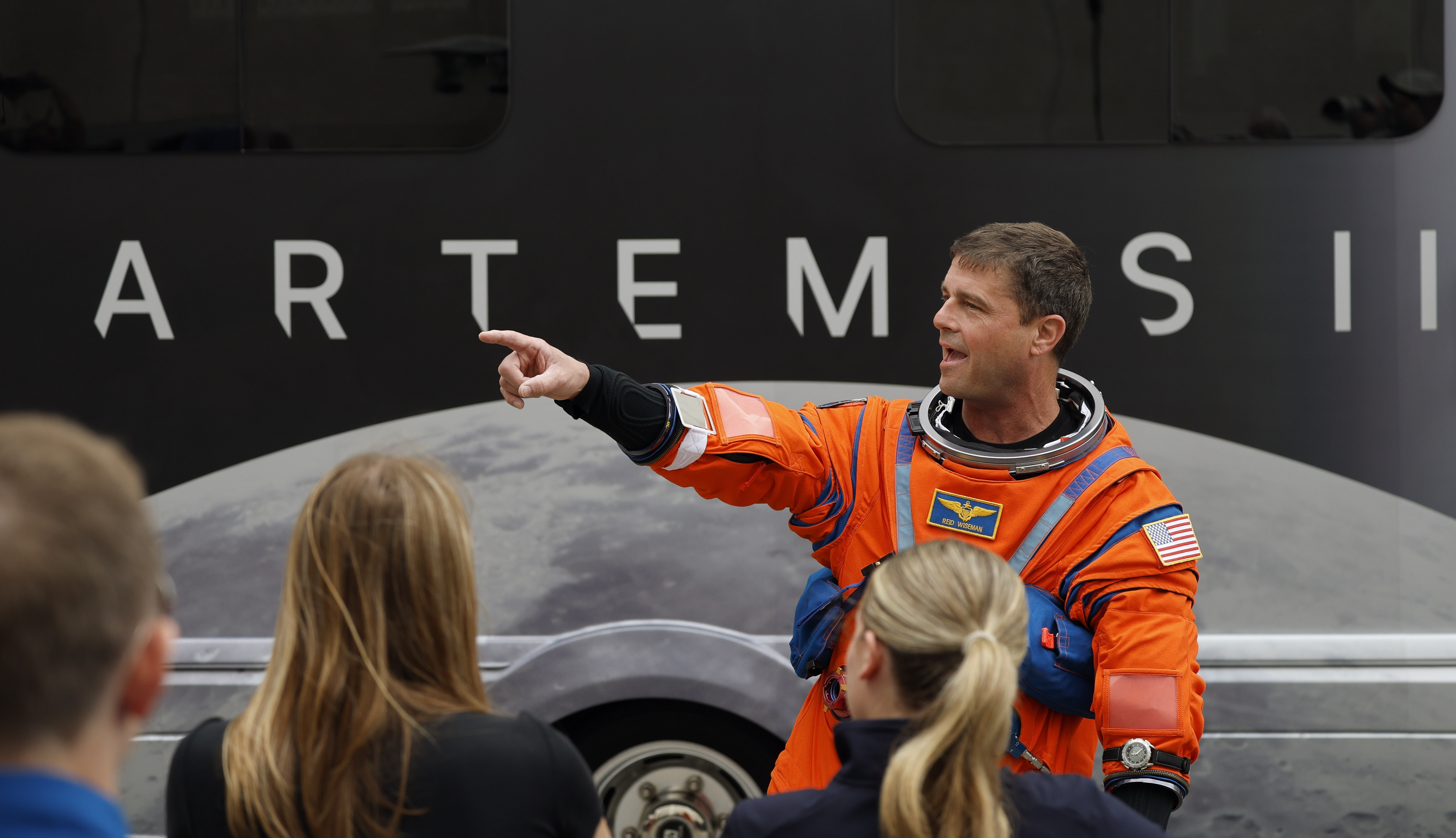Artemis II commander Reid Wiseman talks with loved ones during...