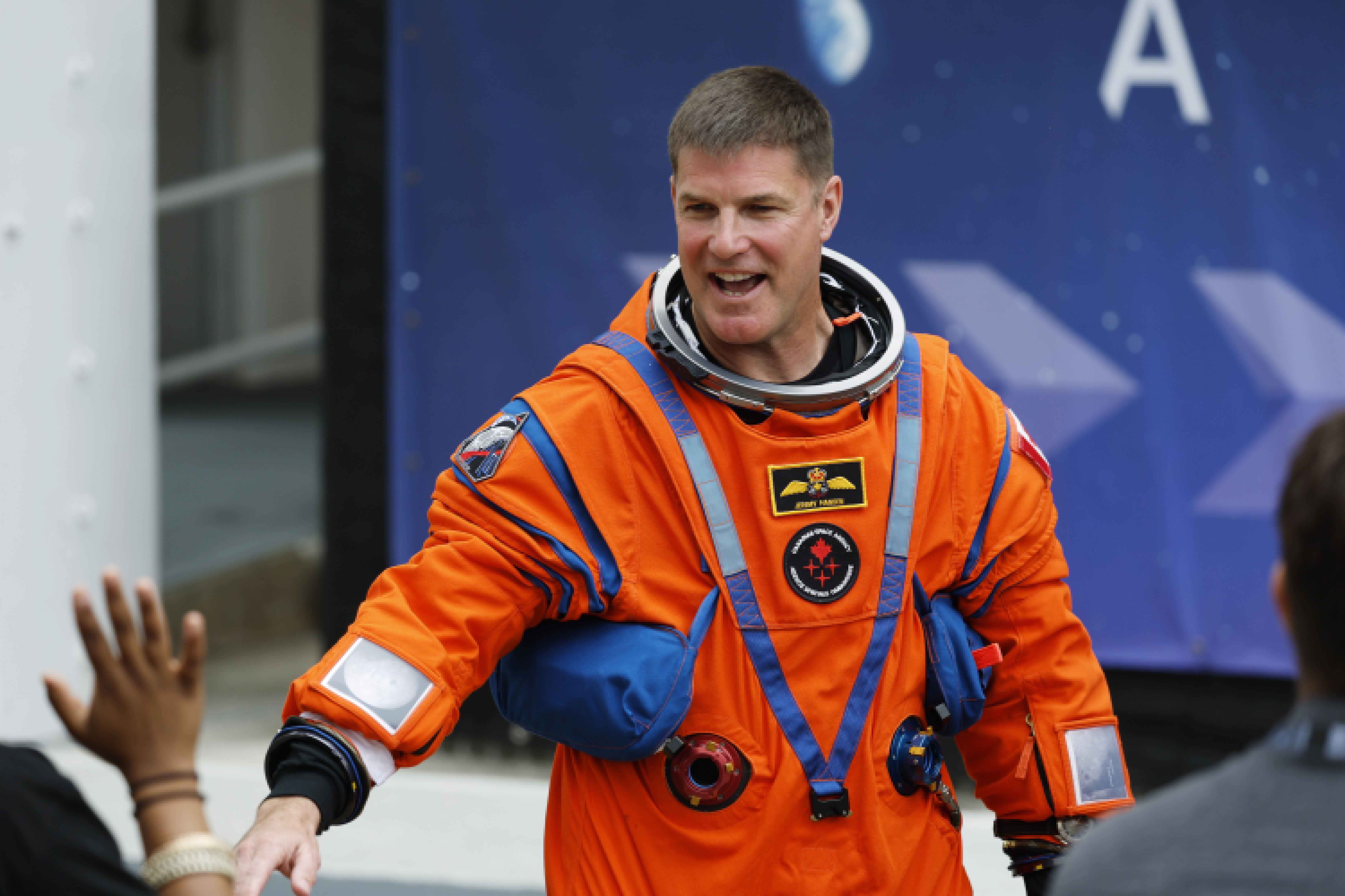 Artemis II mission specialist Jeremy Hansen talks with loved ones...