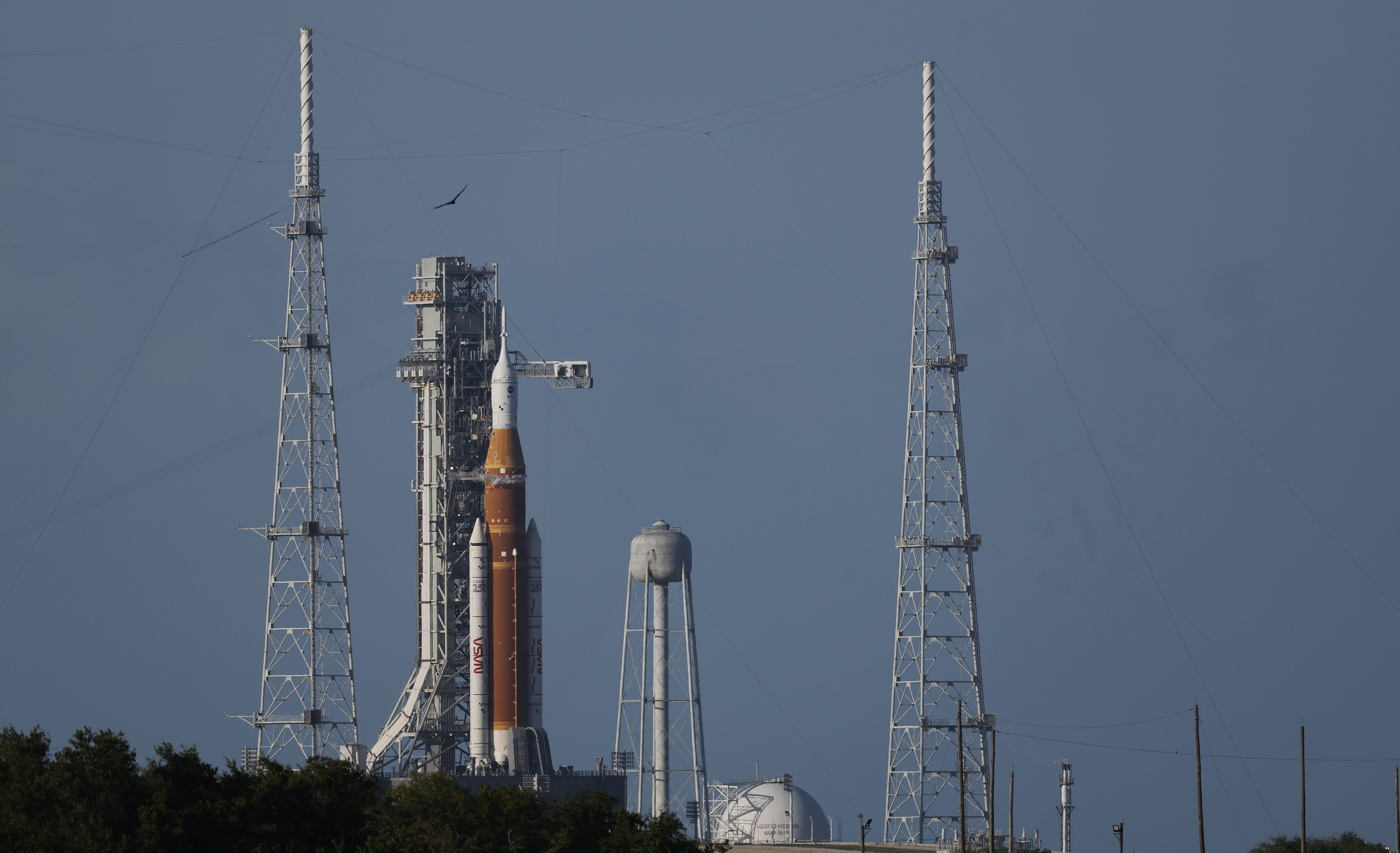 The crew access arm is retracted before the launch of...