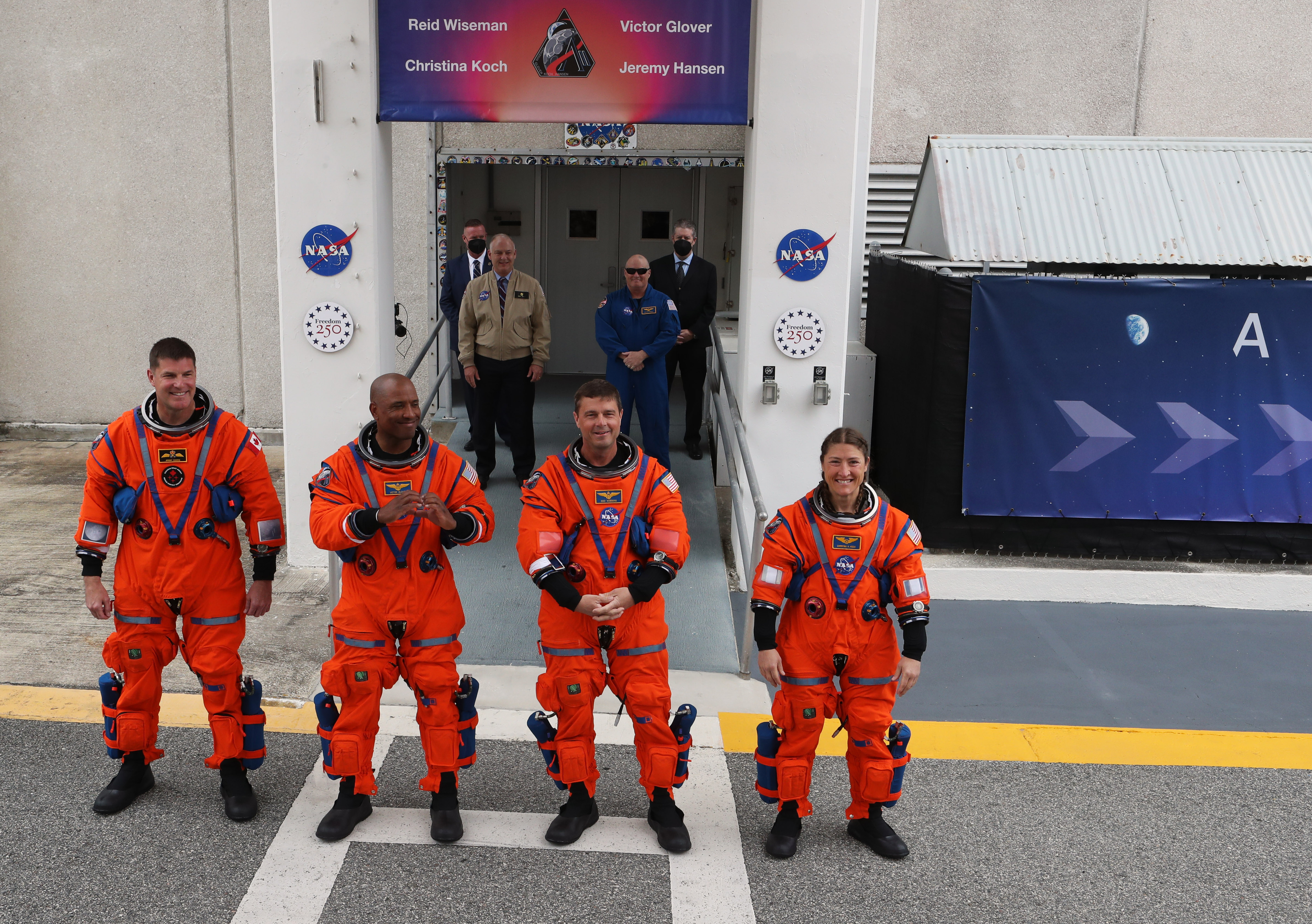 From left, The Artemis II crew mission specialist Jeremy Hansen,...