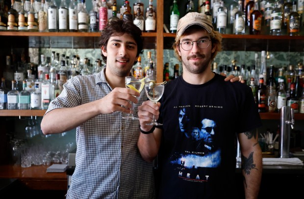 Brothers and bartenders Leo and Zack Rees pose for photos with their drinks at at d.b.a. Located next to The Strand, this two-prong family operation is a popular one. And a former Restaurat of the Year in the Orlando Sentinel Foodie Awards. (Ricardo Ramirez Buxeda/ Orlando Sent inel)