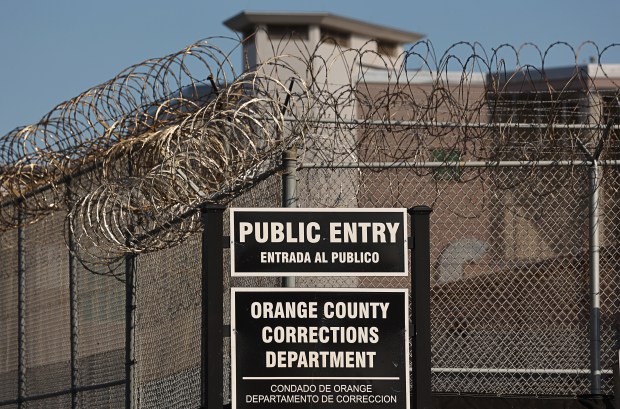 Signs outside the Orange County Jail and Booking and Release Center, on Friday, January 31, 2025. (Ricardo Ramirez Buxeda/ Orlando Sentinel)