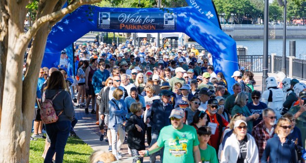 Hundreds of Central Floridians participated Saturday morning in the 11th annual Walk for Parkinson, a charity event for the Parkinson Association of Central Florida. The event at Cranes Roost Park in Altamonte Springs raised more than $150,000 to help fund local programs, education and research projects to find a cure for the neurological disorder. An estimated 90,000 new cases of Parkinson's disease are diagnosed each year in the U.S. (Roger Simmons/Orlando Sentinel)