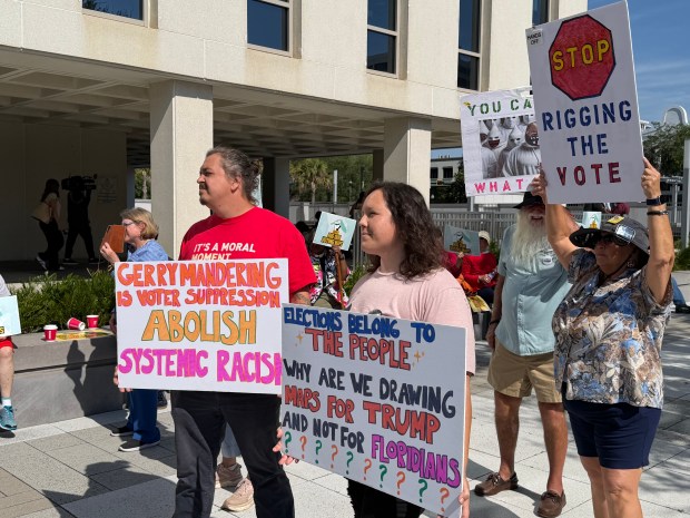 People came from all over Florida to the State Capitol Tuesday, April 28, 2026, to protest Gov. Ron DeSantis' new congressional map, which eliminates four of the state's eight Democratic seats including the state's only Hispanic-majority district. giving Republicans a 24-4 edge. (Jeffrey Schweers/Orlando Sentinel)