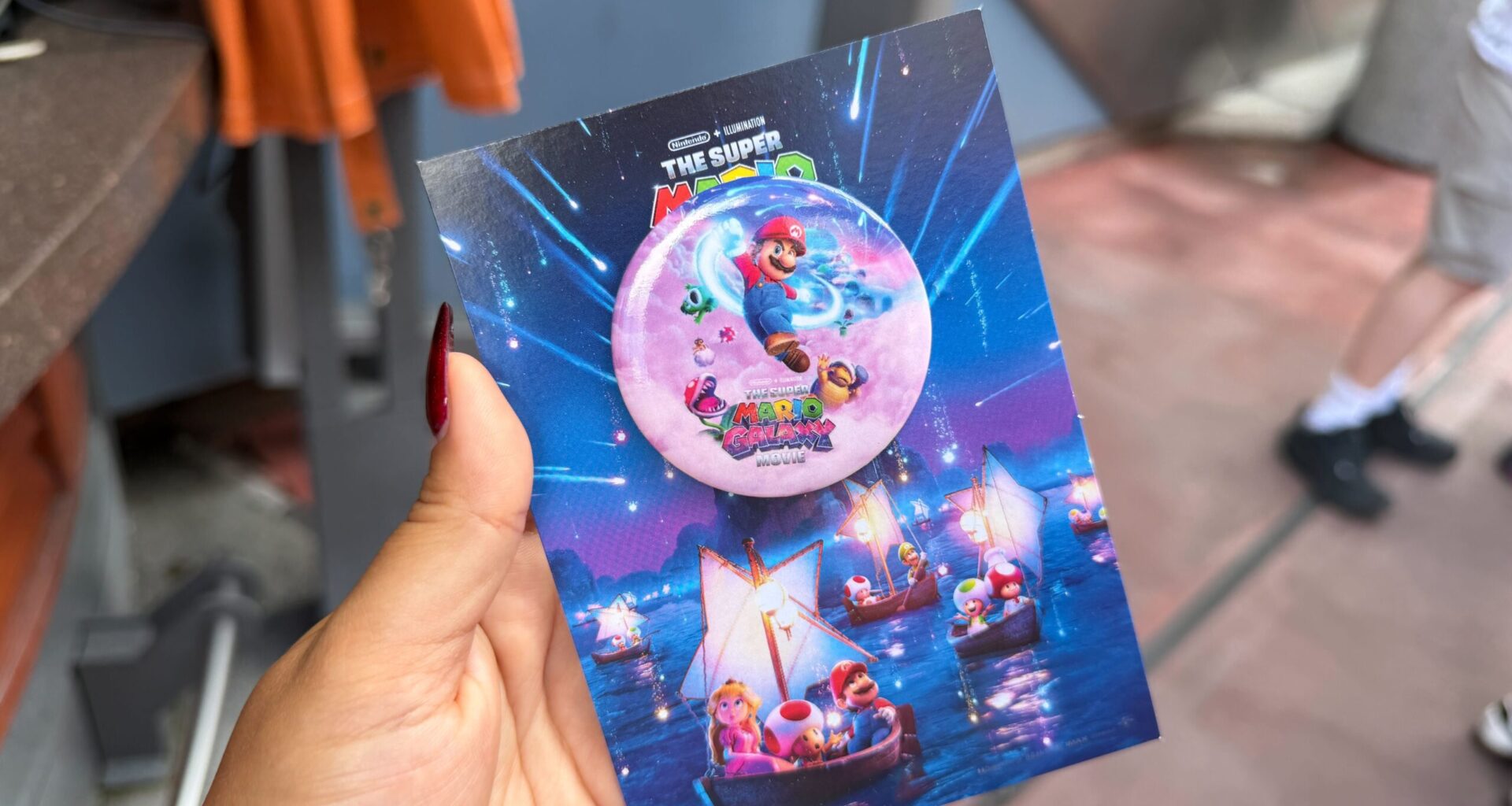 Souvenir 'The Super Mario Galaxy Movie' Button Plus Free Movie Tickets at Universal Orlando