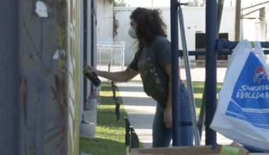 First two artists begin painting shipping container murals at SoMo Walls