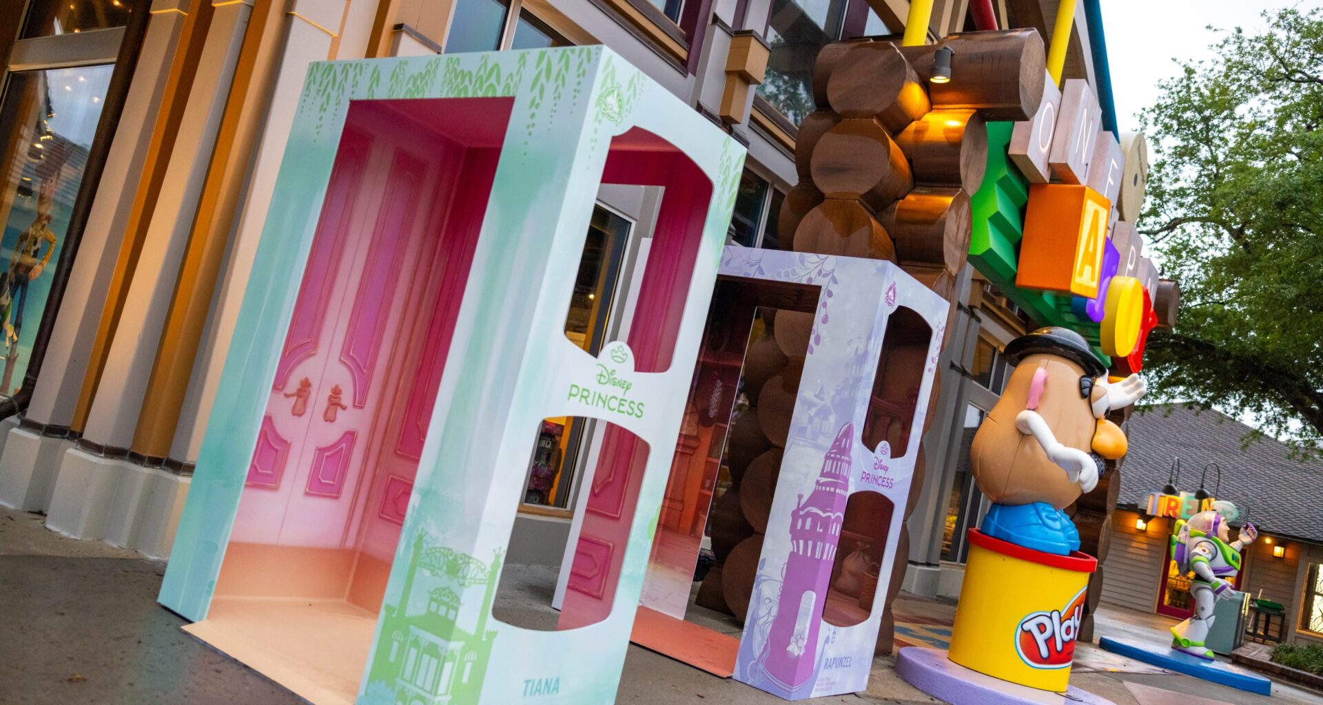 Life-sized Tiana and Rapunzel doll box photo op coming to Disney Springs.