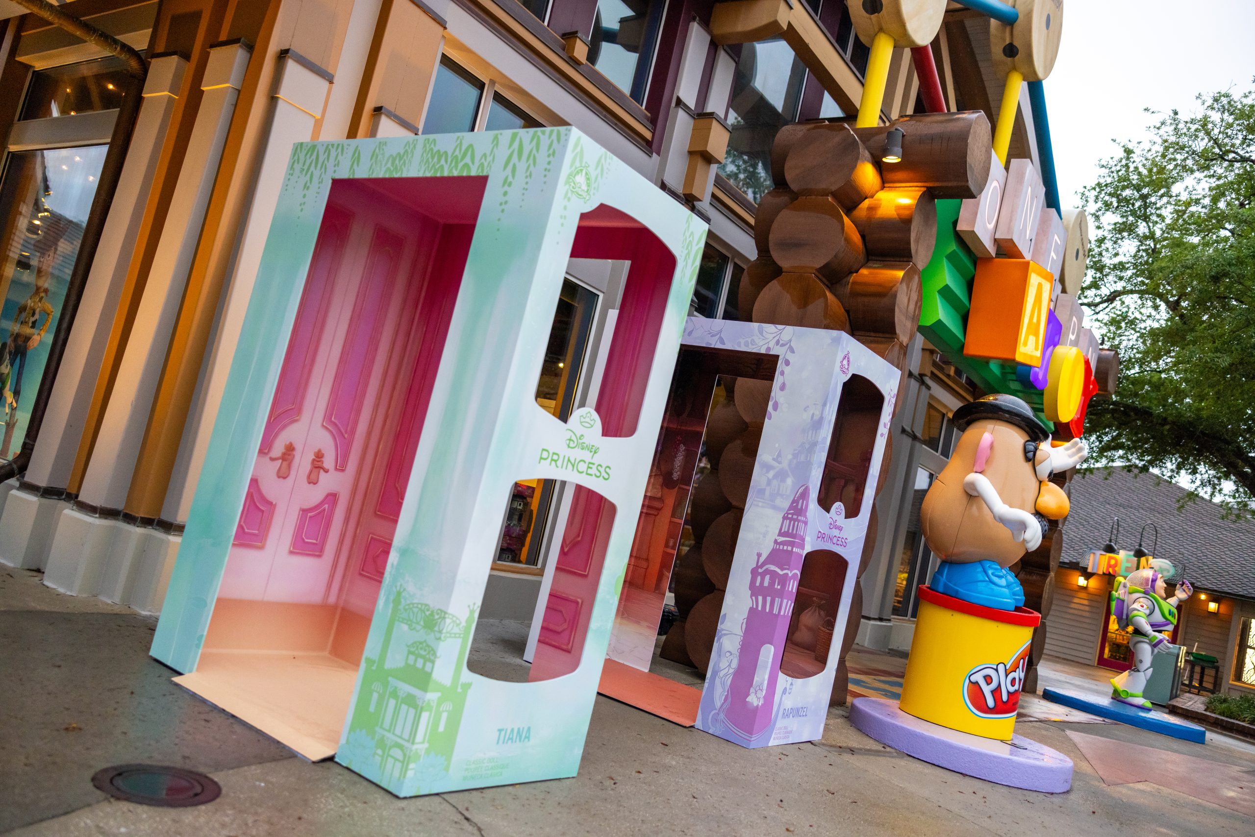 Life-sized Tiana and Rapunzel doll box photo op coming to Disney Springs.