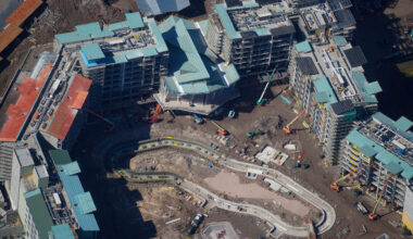 An aerial photo by bioreconstruct shows the lobby of Disney Lakeshore Lodge that overlooks the lazy river. Concrete was recently poured for the loop of the river.
