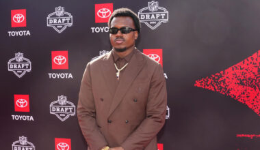Apr 23, 2026; Pittsburgh, PA, USA; Miami Hurricanes defensive end Rueben Bain Jr. poses on the red carpet before the 2026 NFL Draft at Point State Park. Mandatory Credit: Kirby Lee-Imagn Images