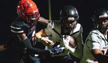 Logan Flaherty,#17, the qurterback for the Port Charlotte football team gains yards at South Fort Myers on Thursday, Sept. 25, 2025.