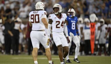 Sep 28, 2024; Dallas, Texas, USA; Florida State Seminoles defensive lineman Grady Kelly (90) and defensive back K.J. Kirkland (24) celebrate during the game between the Southern Methodist Mustangs and the Florida State Seminoles at Gerald J. Ford Stadium. Mandatory Credit: Jerome Miron-Imagn Images