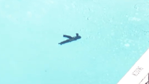 What appears to be a gun is seen in a swimming pool near the scene of a fatal shooting in Coral Springs on May 14, 2026.
