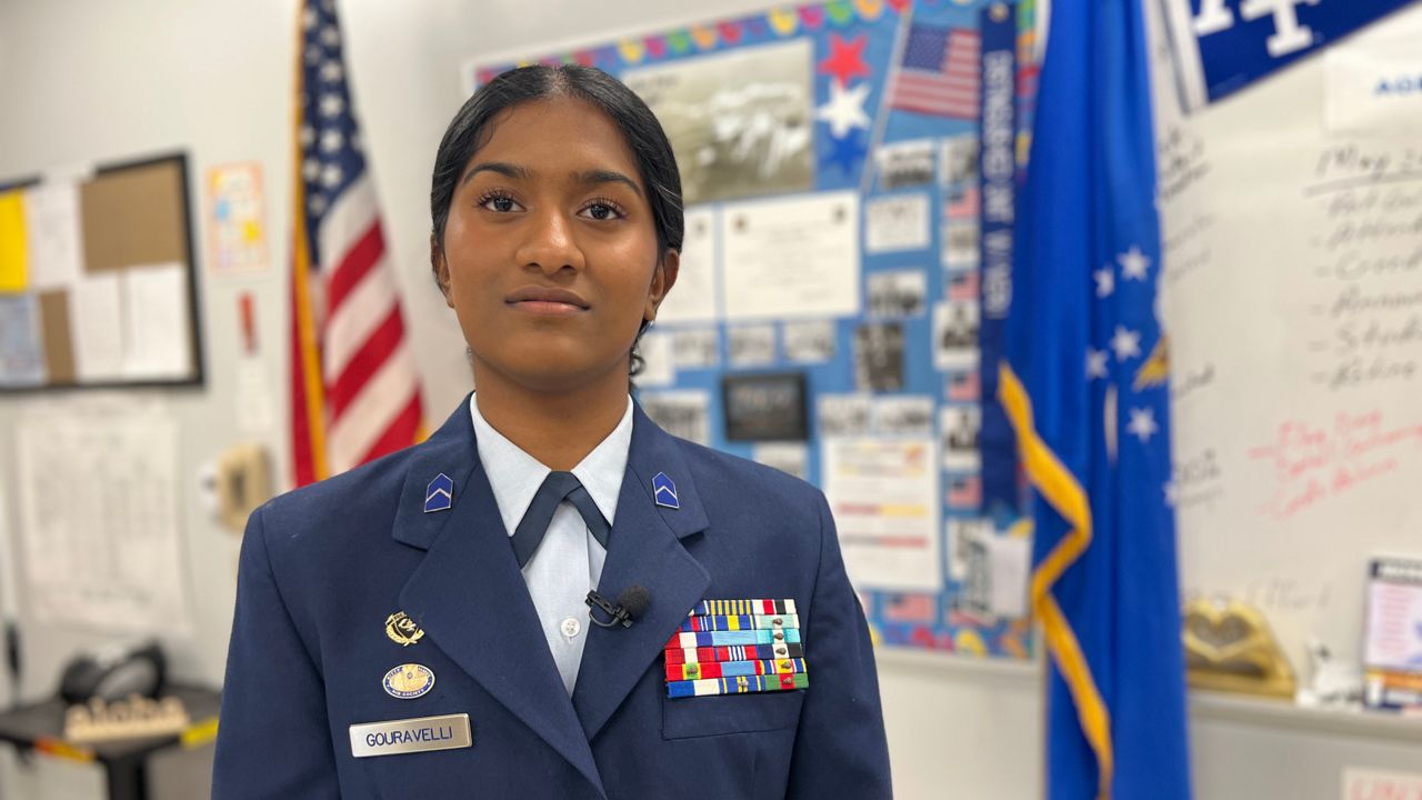 Arthi Gouravelli is making history in the halls of Middleton High School.  Her JROTC instructors say she’s the first they know of to ever receive the National Society of the Sons of the American Revolution JROTC award. (Spectrum News/Fallon Silcox)