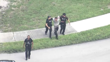 A driver is taken into custody after a pursuit and foot chase ended in Miami Gardens on May 27, 2026.