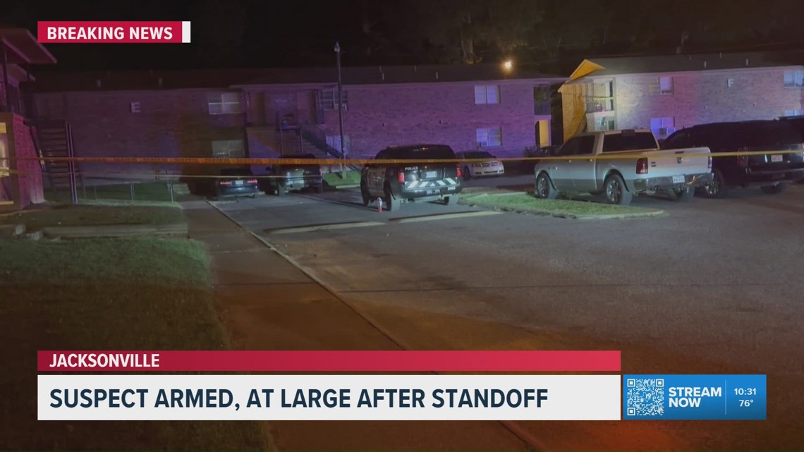 Jacksonville police search for armed suspect after standoff