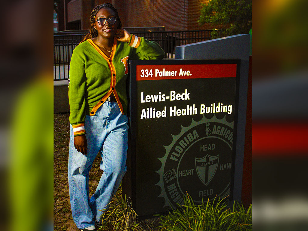 Raleigh Ford poses outside Florida A&M University’s Lewis-Beck Allied Health Building, where she cultivated her passion for public health through research, leadership and service. (Photo Courtesy: Raleigh Ford)