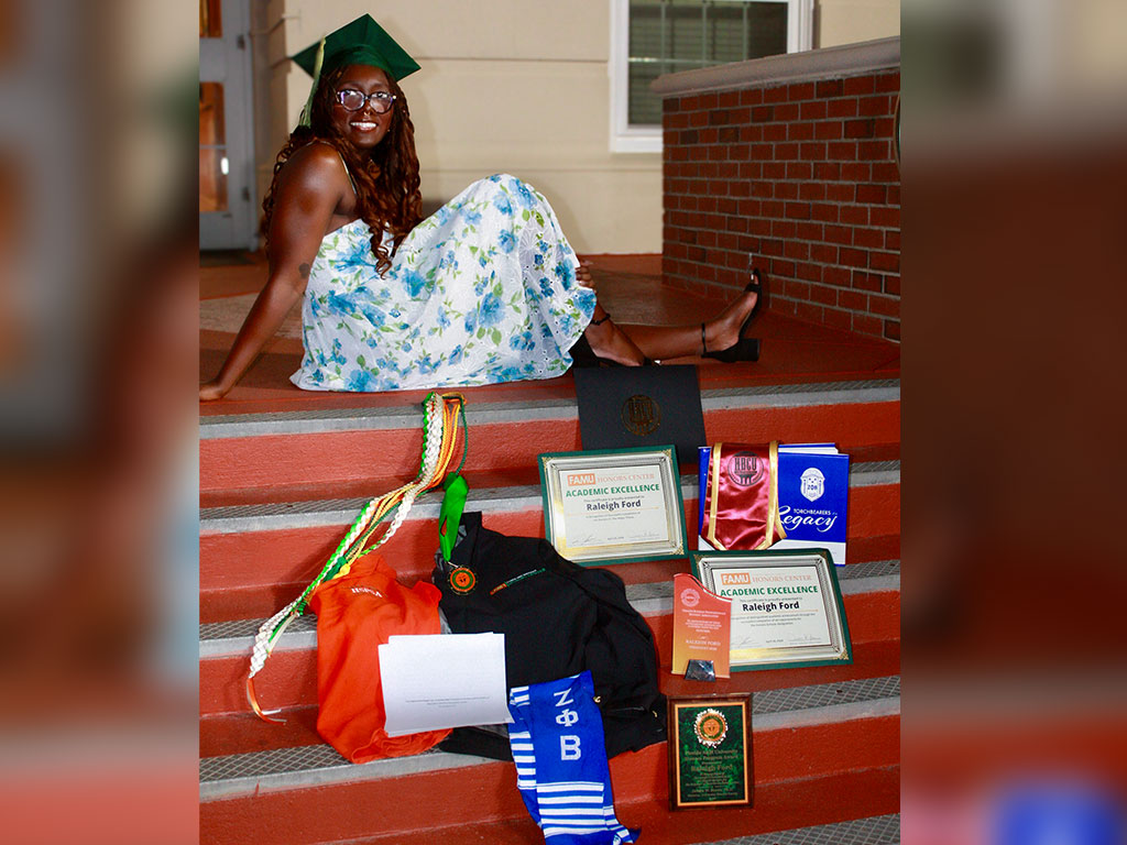 Recent Florida A&M University graduate Raleigh Ford poses with academic honors and graduation regalia, reflecting a college journey defined by scholarship, leadership and service. (Photo Courtesy: Raleigh Ford)