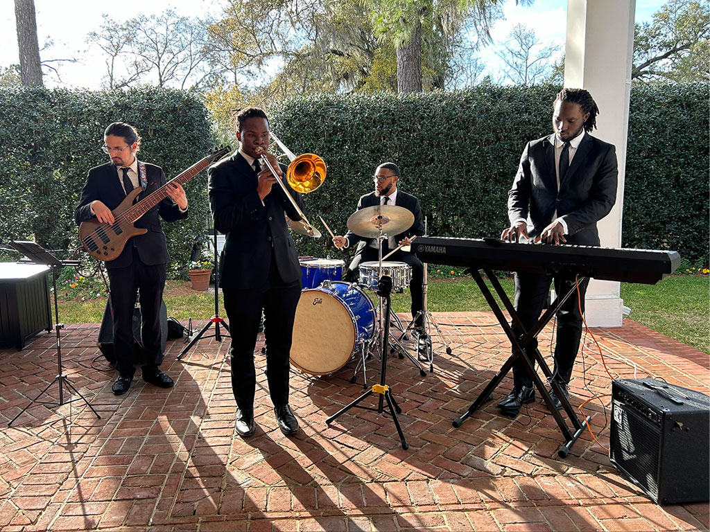 Florida A&M University alumnus Gamaliel Harris performs with a jazz ensemble during a live performance. Harris said opportunities to perform throughout his time at FAMU helped strengthen both his musicianship and confidence. (Photo courtesy: Gamaliel Harris)