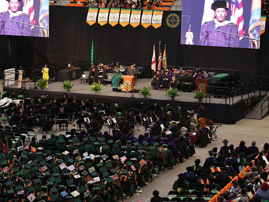 Omar Goff Aeriel shot of Omar Goff giving commencement address.
