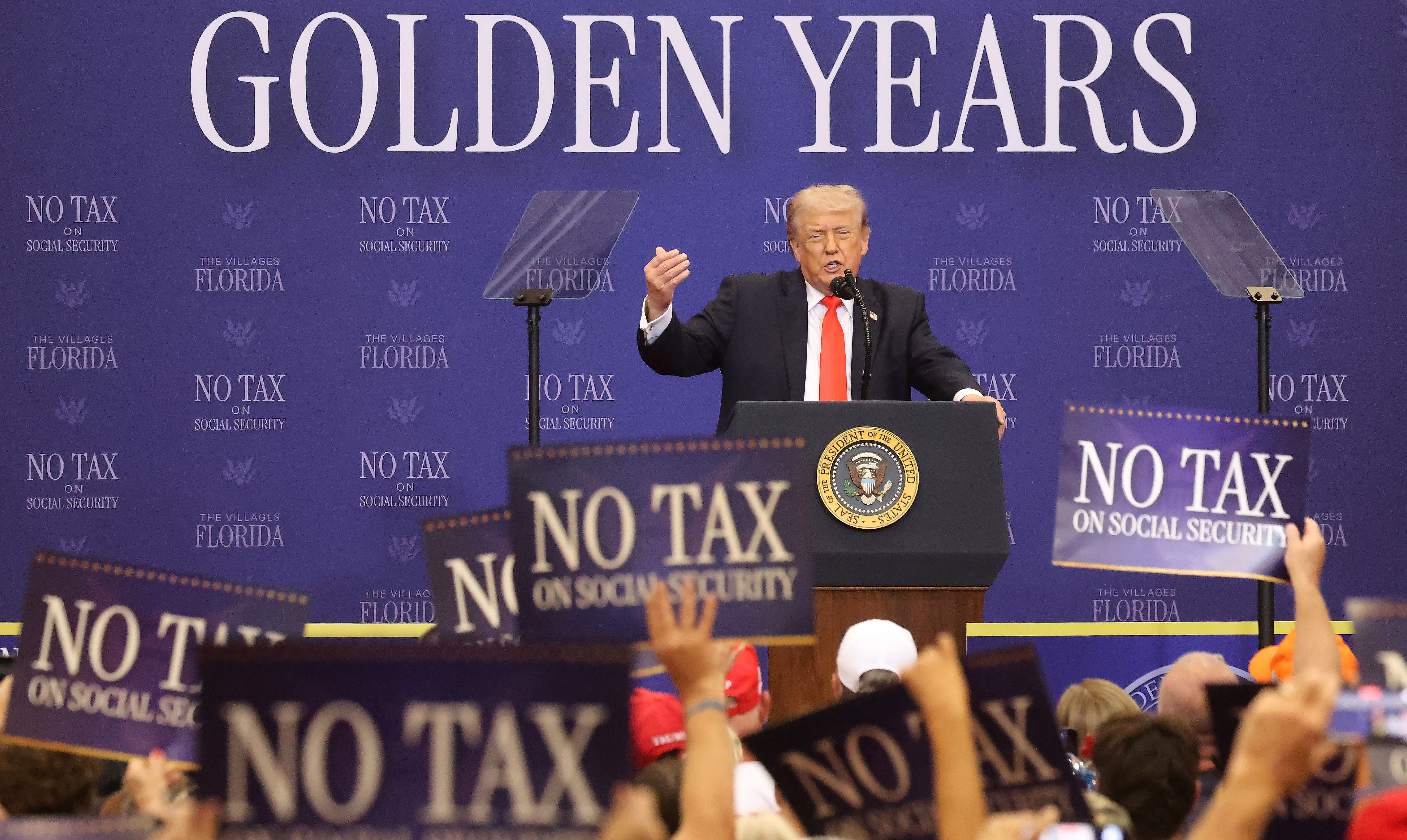 President Donald Trump delivers remarks to a cheering crowd at...