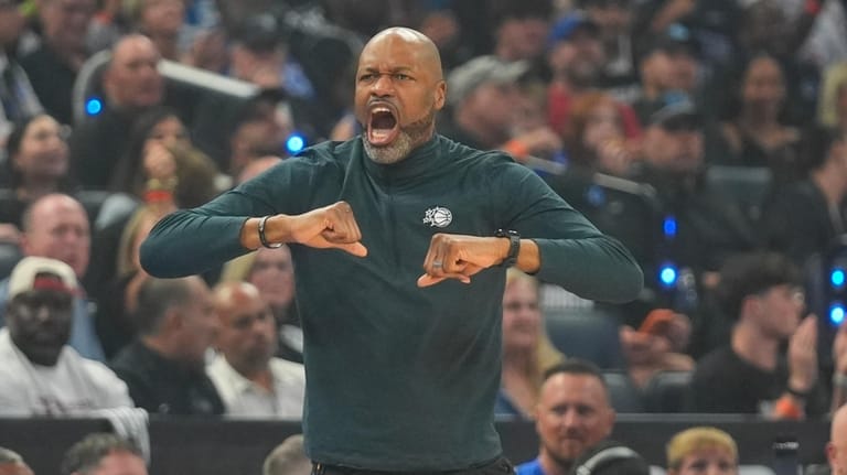 Orlando Magic head coach Jamahl Mosley directs his team against...