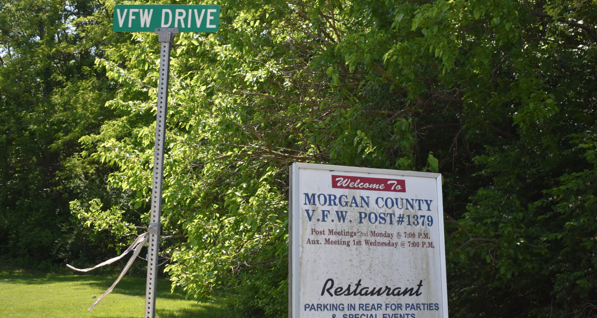 The sign for the VFW sits on VFW Drive, south of Morton Avenue. The empty building has been sold to Harmony Masonic Lodge No. 3.