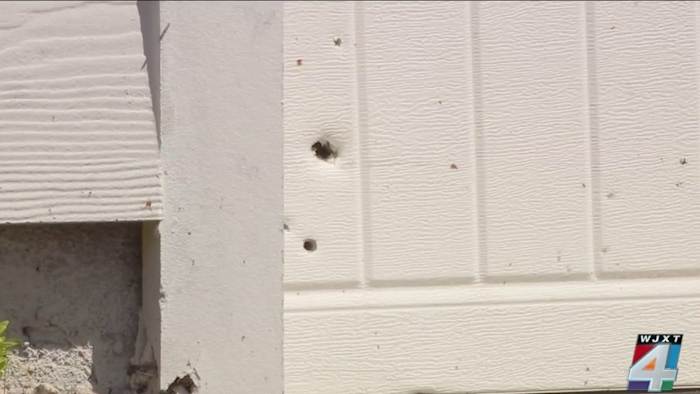 Neighbors share concerns after man shot, killed by police steps from their front doors, bullet holes left in homes